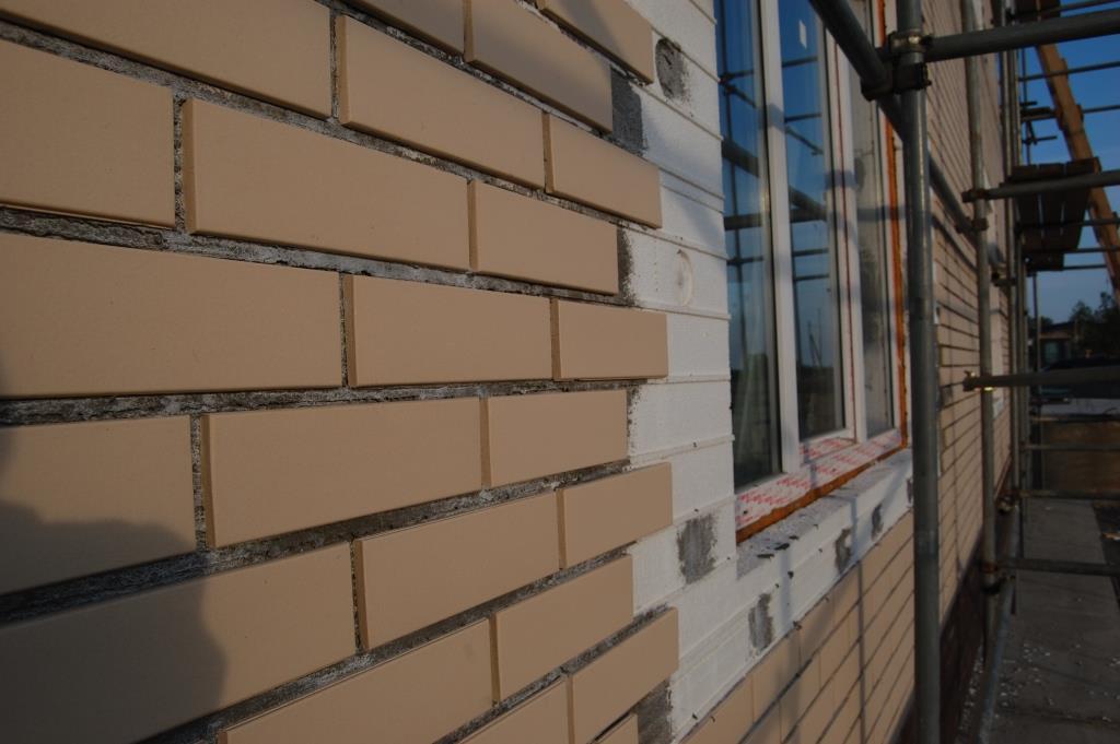 Фасадные термопанели: для отделки фасада дома с утеплителем и клинкерной плиткой, панели для наружной обшивки российского производства, отзывы о теплоизоляционных свойствах материала