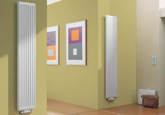 Вертикальные радиаторы (79 фото): трубчатые батареи с нижним подключением для отопления квартиры