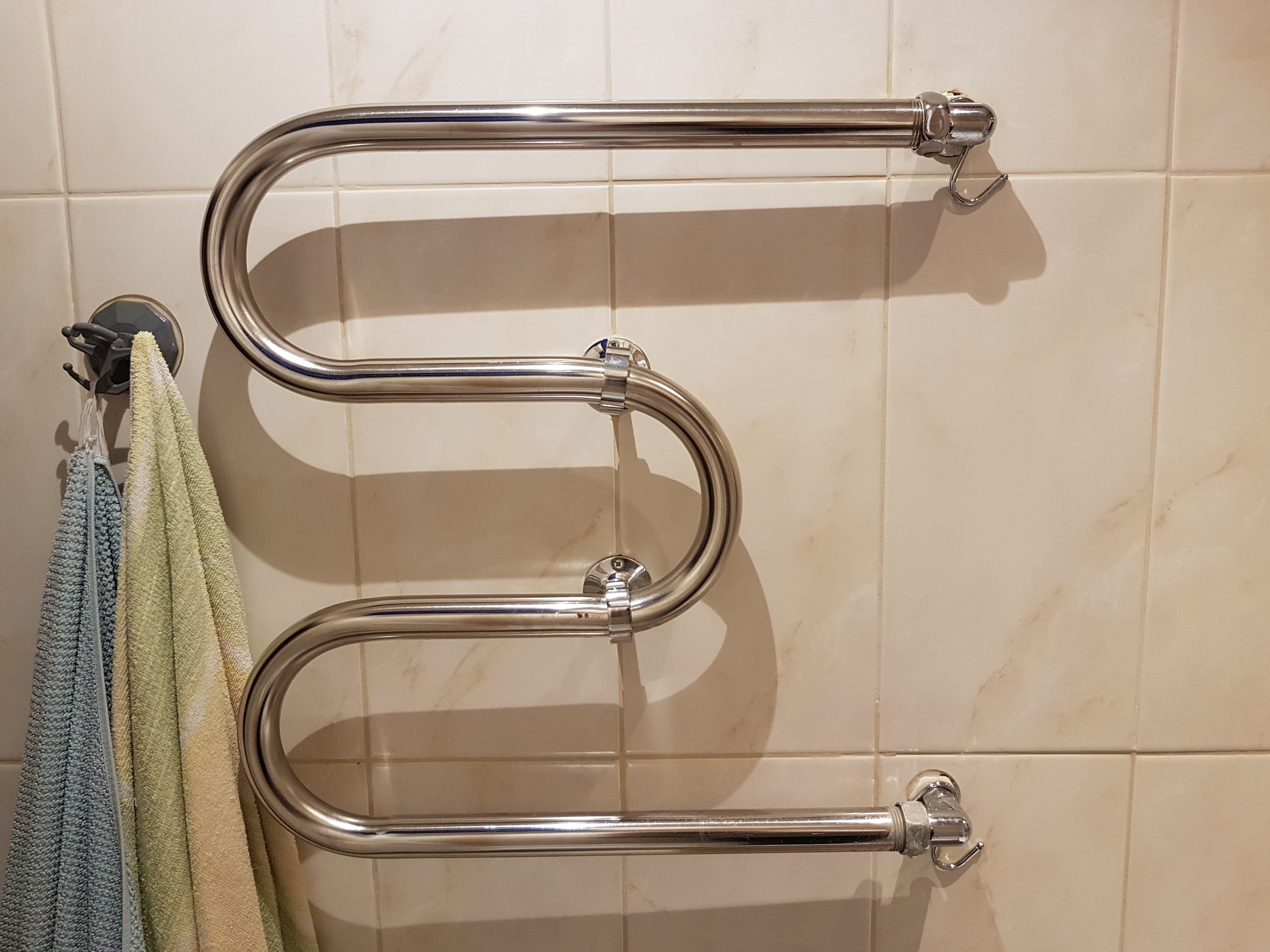 Змеевик для ванной комнаты: советы по выбору и установке